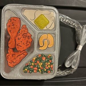 Current Mood Silver and Red Crossbody Bag with Unique Design